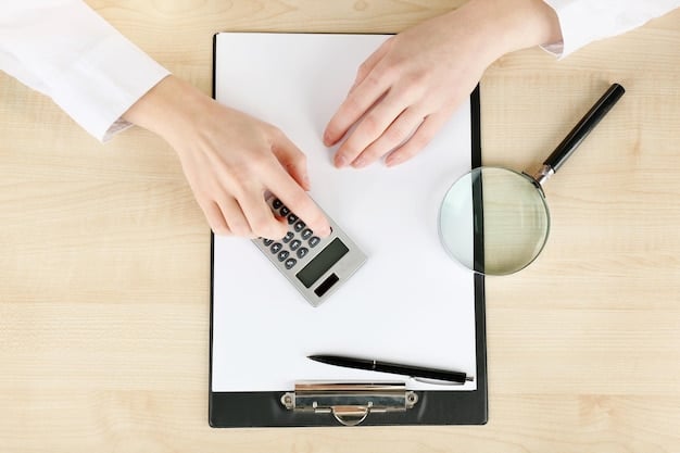 Hands holding a credit report with a magnifying glass hovering over it, with a calculator and pen lying nearby.