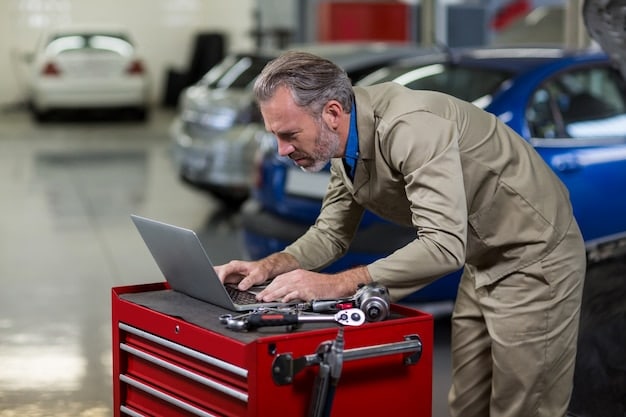A mechanic using diagnostic tools to check the engine of a used car in a workshop. Focus on the tools and the mechanic's expertise.
