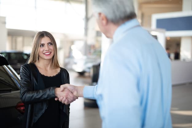 A smiling person shaking hands with a car dealer after successfully negotiating the price of a used car. Focus on the handshake and the expression of satisfaction.