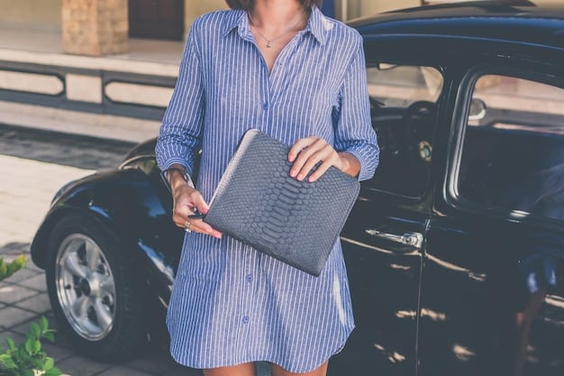 A person standing in front of their car, holding a folder with maintenance records. The car is parked in a driveway, and the house is visible in the background.