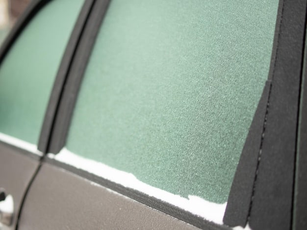 Close-up shot of a car door panel made from a composite of hemp fibers and recycled plastic. The texture of the hemp is visible, and a hand is touching the panel to demonstrate its durability and eco-friendly nature.