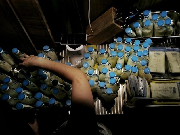 A photograph depicting workers in a clean, organized facility sorting and inspecting components from disassembled EV batteries, highlighting the detailed process of material separation and recovery.