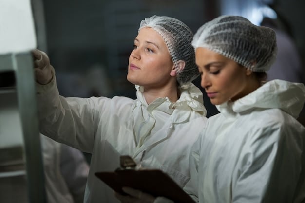 A close-up shot of a worker in a cleanroom environment assembling battery cells within a US-based gigafactory, showcasing precision and advanced manufacturing technology.