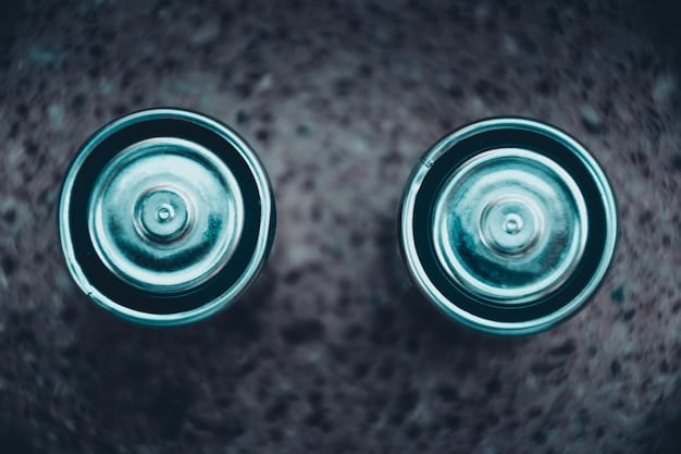 A close-up, detailed graphic comparing the internal structure of a traditional lithium-ion battery (left) with a solid-state battery (right). The solid-state battery is depicted as more compact and streamlined, with a clear visual representation of the solid electrolyte layer.