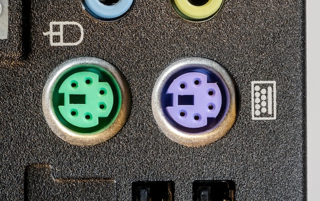 A close-up shot of different types of EV charging connectors (CHAdeMO, CCS, Tesla) side-by-side, highlighting the variations in their design and pin configurations. The connectors are arranged on a clean, white background to emphasize their differences.