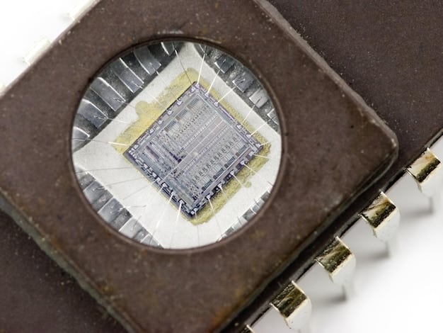 A close-up image of a silicon wafer filled with semiconductor chips. The chips are highly detailed, and the background is a blurred image of a factory, emphasizing the complexity and high-tech nature of semiconductor manufacturing.