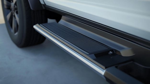 An image showing the underside of the 2025 Jeep Grand Cherokee, with skid plates prominently displayed. The vehicle is lifted, providing a clear view of the underbody protection.
