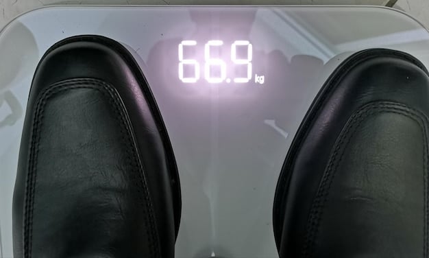 A close-up of the 2025 BMW 3 Series's dashboard, highlighting the curved display integrating the 12.3-inch information display and the 14.9-inch control display showing the new iDrive 8.5 Operating System.