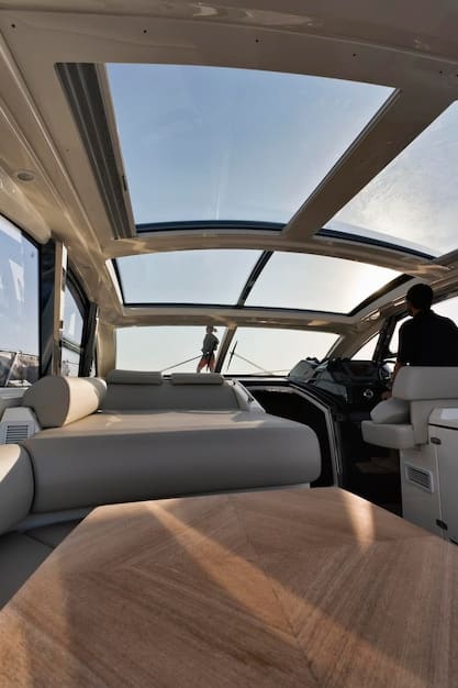 Interior view of the 2025 Hyundai Kona Electric, showing the spacious cabin, comfortable seats, and panoramic sunroof.