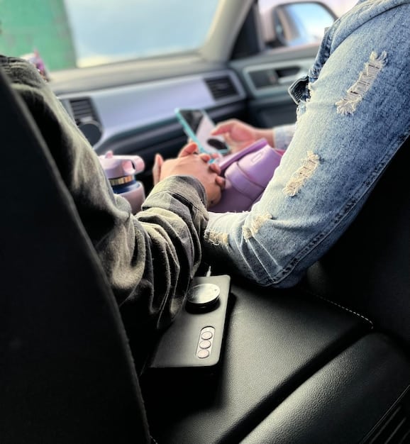 The interior of a 2025 Subaru Outback, showcasing the infotainment screen, dashboard layout, and comfortable seating material. The focus is on the modern design and spaciousness of the cabin.