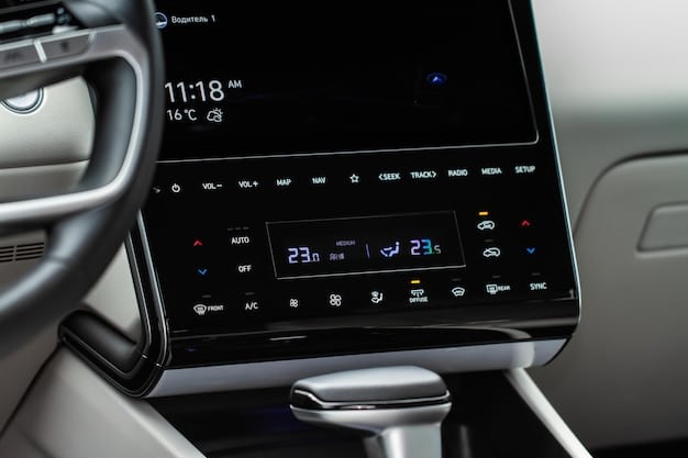Close-up of the 2025 Nissan Rogue's dashboard, showcasing the infotainment screen, climate controls, and premium materials used in the interior.