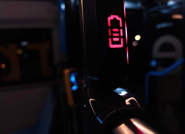 A close-up of the 2025 Tesla Model 3's charging port during a fast-charging session, highlighting the charging speed and battery percentage on the car's display.