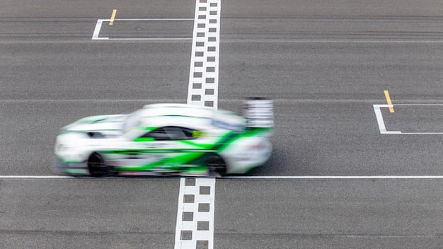 The 2025 BMW 3 Series performing a controlled drift on a racetrack, showcasing its agility and handling capabilities. The image captures the car from a low angle.