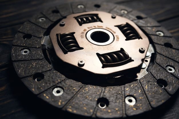 A close-up of the 2025 Porsche 911's braking system, highlighting the large brake rotors, multi-piston calipers, and the distinctive Porsche Ceramic Composite Brakes (PCCB).