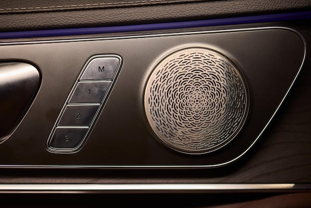 A close-up of the 2025 Cadillac Escalade's dashboard, highlighting its curved OLED display and luxurious leather stitching.