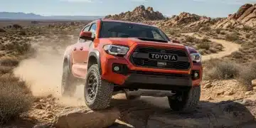 2026 Toyota Tacoma TRD Pro tackling a challenging rocky off-road trail with enthusiasm