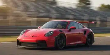 2026 Porsche 911 GT3 RS in Guards Red on track, highlighting its advanced aerodynamics and high-performance design.
